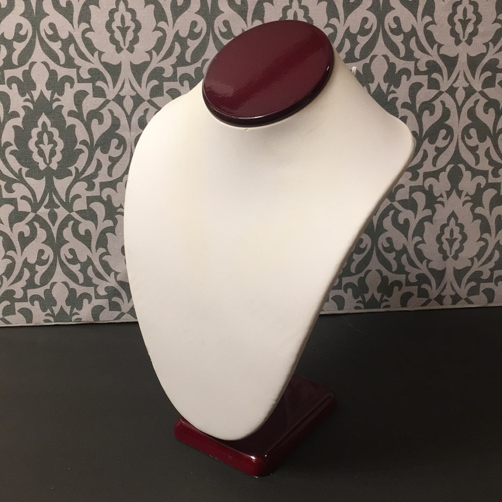 Rosewood and white leatherette Jewelry display.